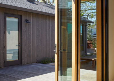 retractable accordion door from dining room onto the back patio for indoor outdoor living