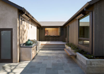 private patio featuring an outdoor kitchen