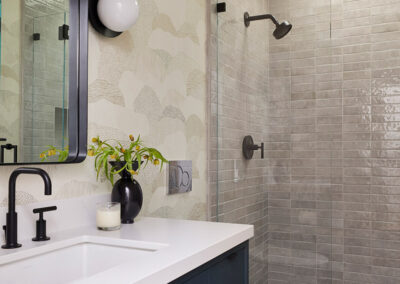 modern bathroom with clean lines and wallpaper in natural tones