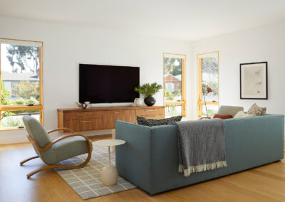 living room with lots of natural light and midcentury modern touches